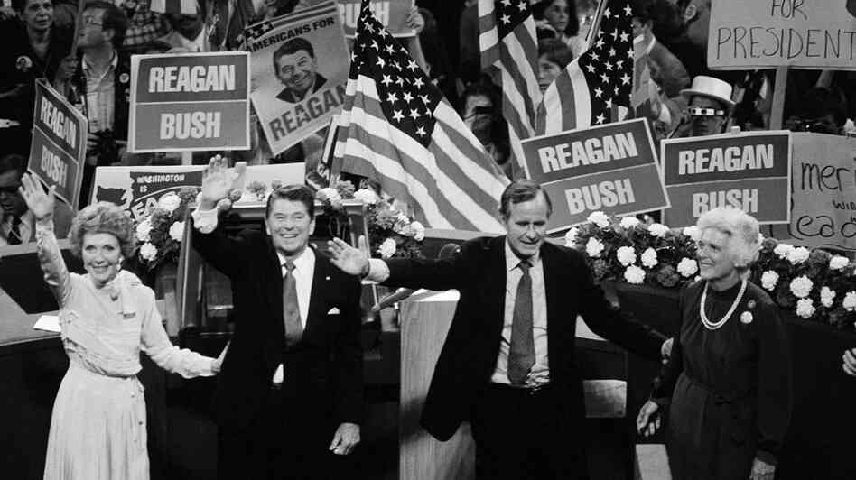GOP presidential candidate Ronald Reagan, his running mate, George Bush, and their wives, Nancy Reagan and Barbara Bush, wave from the podium at the 1980 Republican National Convention in Detroit on July 17. In picking Bush, Reagan created a ticket that unified the party.