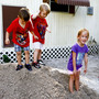 Katrina Bordwell's home was flooded recently after nearby development stopped up a drainage pipe. Bordwell, 24, lives in the community with her children, from left, Leo, 3, her boyfriend's son Kyle Cose, 3, and Zoey, 5.