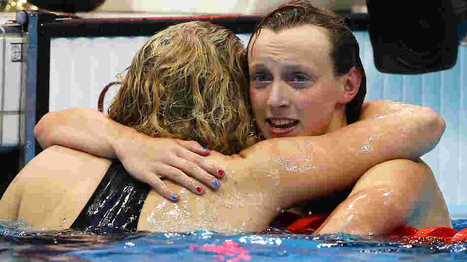 American Katie Ledecky seemed to be in disbelief as she hugged bronze medalist Rebecca Adlington of Great Britain. Ledecky, 15, won the women's 800m freestyle by four seconds in London.