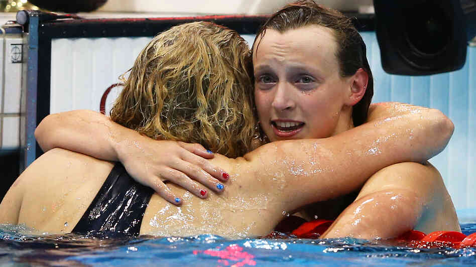 American Katie Ledecky seemed to be in disbelief as she hugged bronze medalist Rebecca Adlington of Great Britain. Ledecky, 15, won the women's 800m freestyle by four seconds in London.
