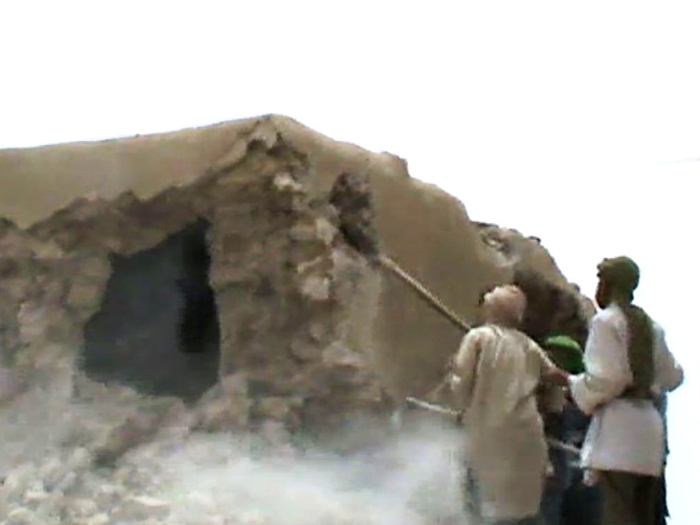 This video still shows Islamist militants destroying an ancient shrine in Timbuktu on July 1. The International Criminal Court warned their campaign of destruction was a war crime.