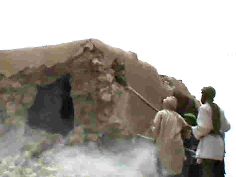 This video still shows Islamist militants destroying an ancient shrine in Timbuktu on July 1. The International Criminal Court warned their campaign of destruction was a war crime.