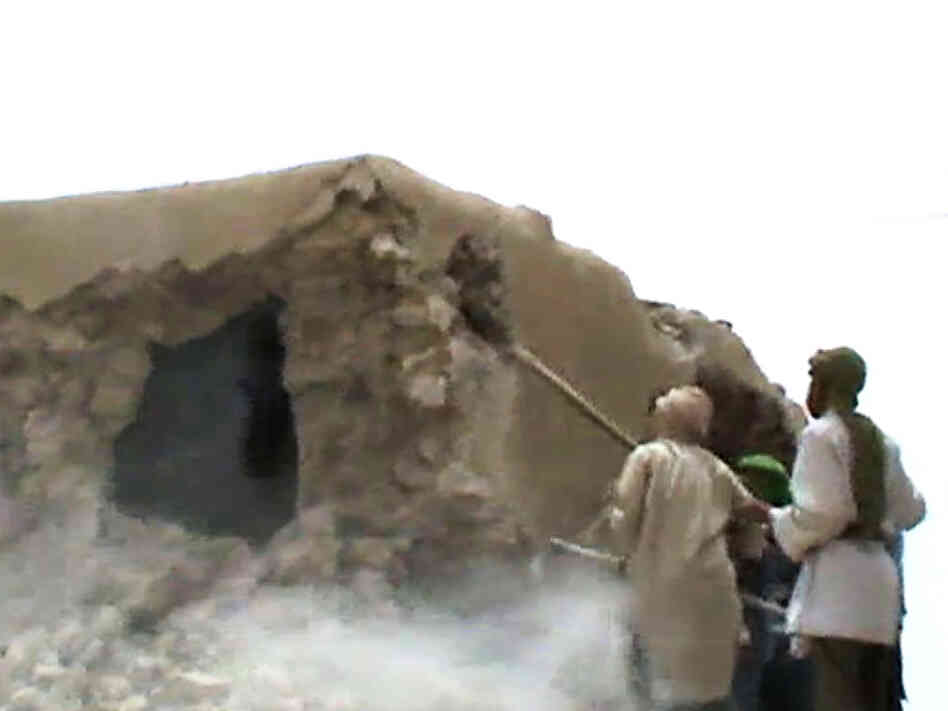 This video still shows Islamist militants destroying an ancient shrine in Timbuktu on July 1. The International Criminal Court warned their campaign of destruction was a war crime.