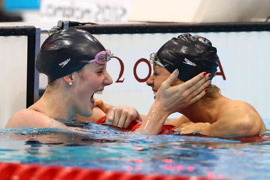 Missy Franklin celebrates winning the women's 200m backstroke final with team mate Elizabeth Beisel on Day 7 of the London 2012 Olympic Games. Beisel placed third in the event.