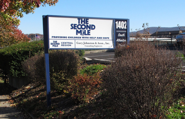 A sign for The Second Mile charity is seen outside the organization's headquarters in State College, Pa., in November of 2011.