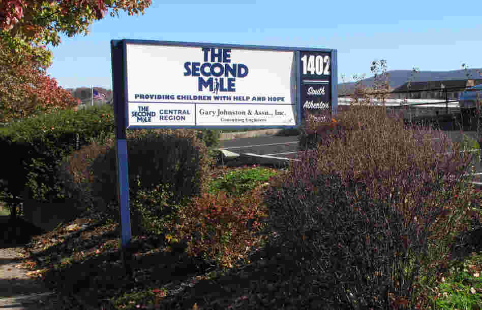 A sign for The Second Mile charity is seen outside the organization's headquarters in State College, Pa., in November of 2011.