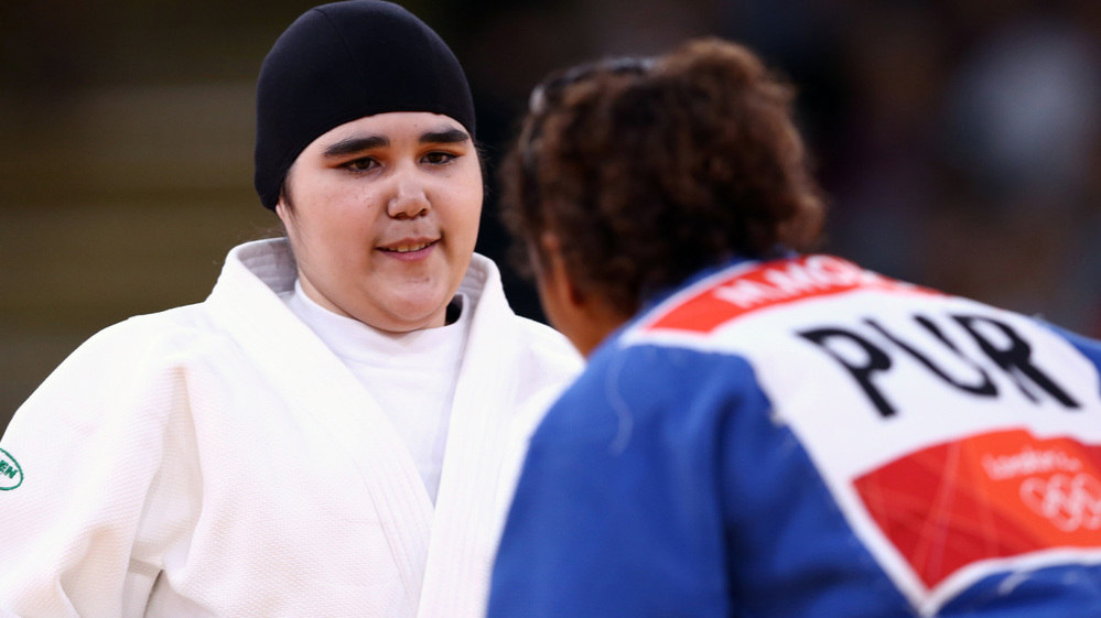 Wojdan Shaherkani of Saudi Arabia (left) met Melissa Mojica in the women's +78 kg judo in London. Their match was short, but historic.