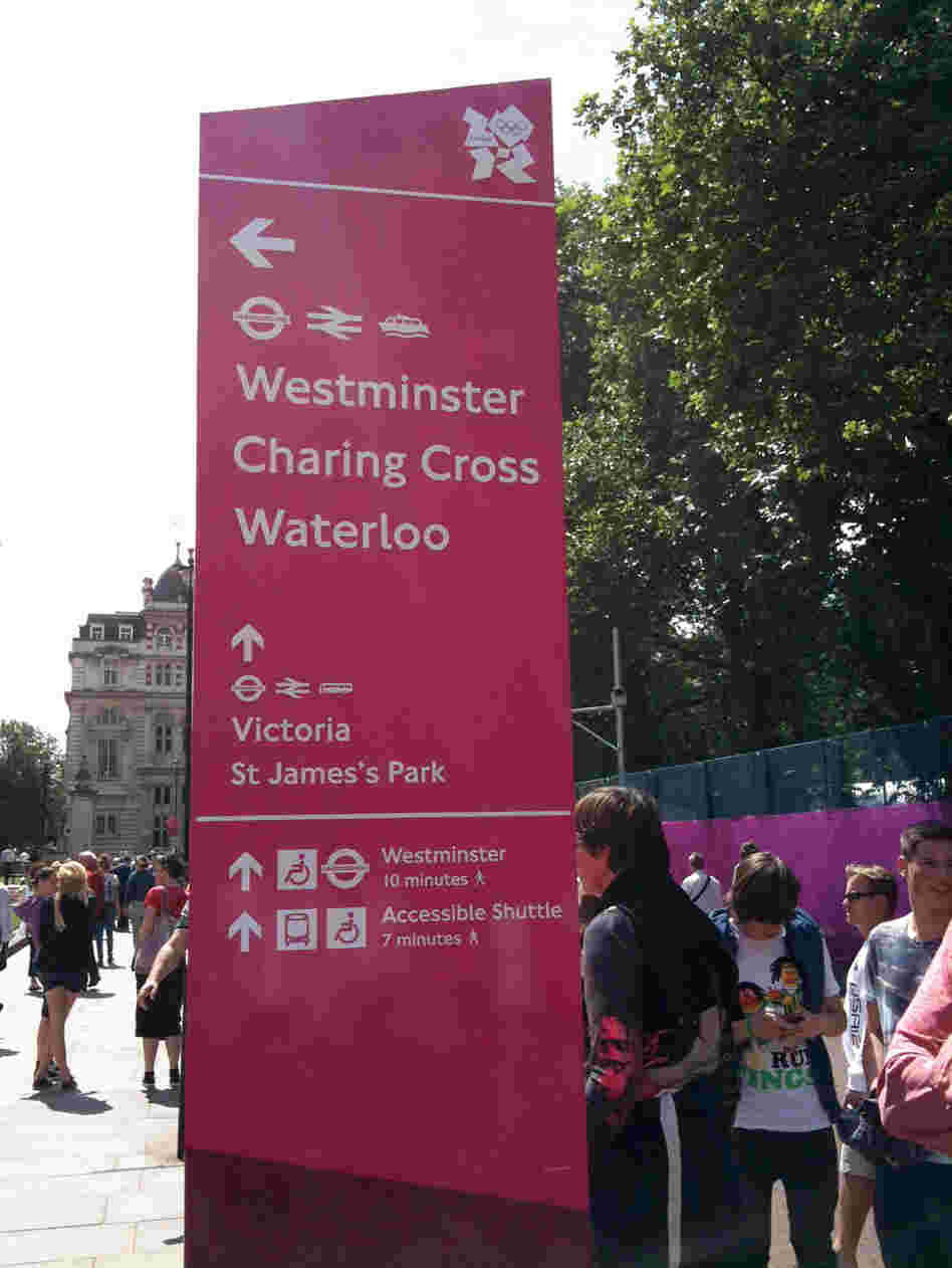 Signs for London's Underground train system were updated with icons to help Olympic visitors find events.