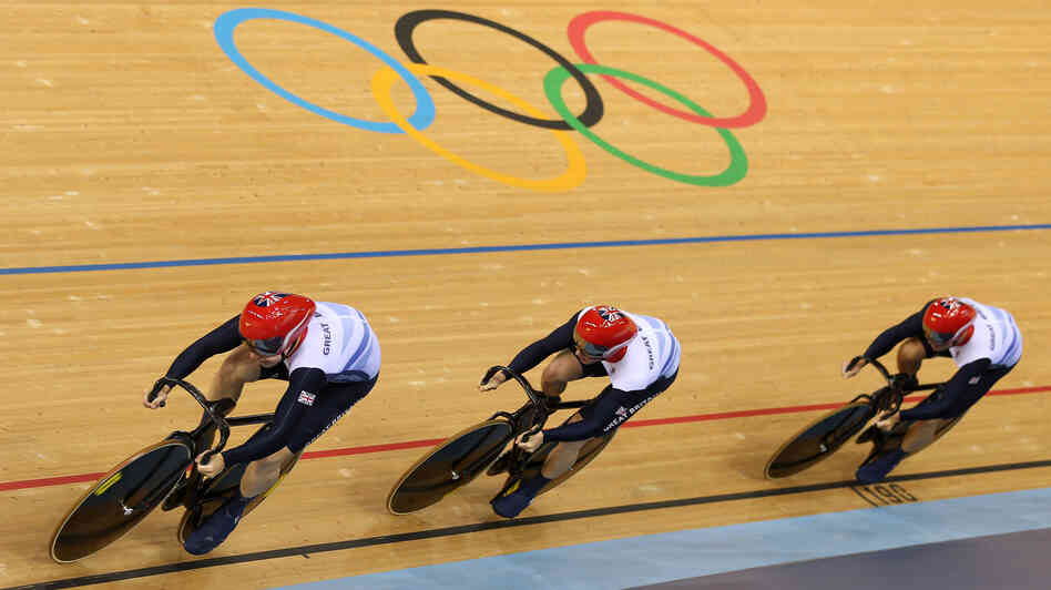 The British sprint team of Philip Hindes (front), Jason Kenny and Sir Chris Hoy won a gold medal Thursday, but remarks by Hindes caused concerns about athletes' ethics to resurface. The IOC says it will not investigate.