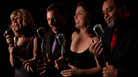 The Uptown Vocal Jazz Quartet, left to right: Ginny Carr, alto; Robert McBride, tenor; Holly Shockey, soprano; and Andre Enceneat, bass. The group's new album, Hustlin' for a Gig, came out in May. The Uptown Vocal Jazz Quartet, left to right: Ginny Carr, alto; Robert McBride, tenor; Holly Shockey, soprano; and Andre Enceneat, bass. The group's new album, Hustlin' for a Gig, came out in May.