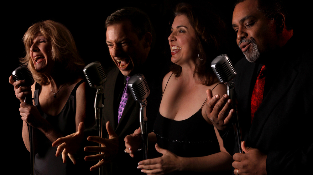 The Uptown Vocal Jazz Quartet, left to right: Ginny Carr, alto; Robert McBride, tenor; Holly Shockey, soprano; and Andre Enceneat, bass. The group's new album, Hustlin' for a Gig, came out in May.