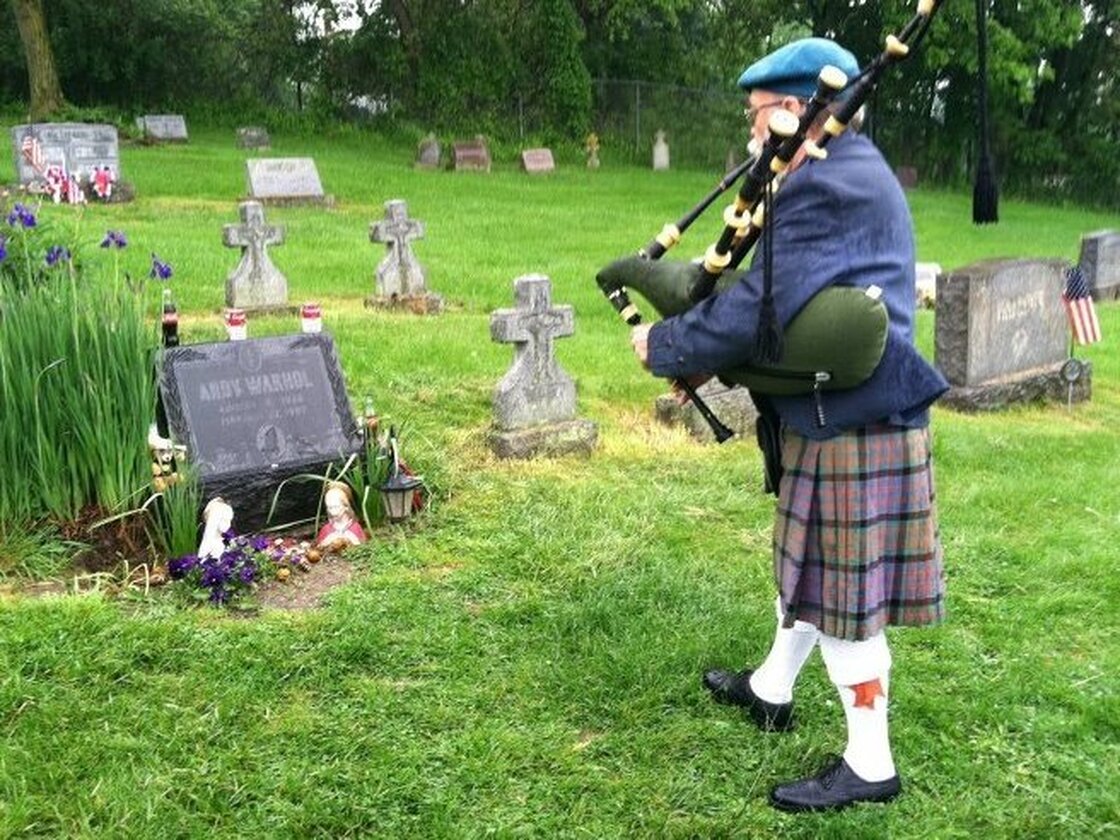 Bagpipe player Dave Olson makes visiting the grave part of his regular routine.
