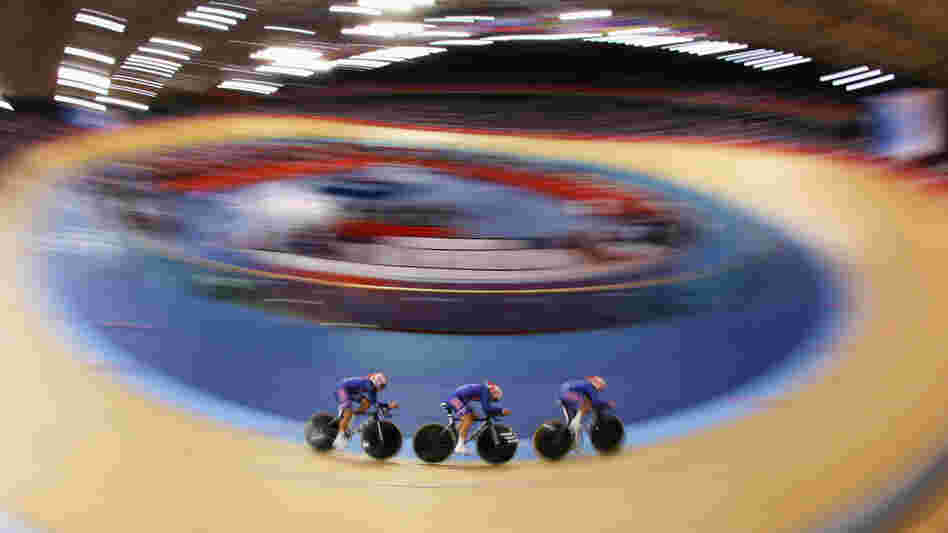 Dotsie Bausch, Jennie Reed and Sarah Hammer of the United States ride in a heat against Australia on Day 8 of the London 2012 Olympic Games at the Velodrome in London, England. The Americans took silver in the final.