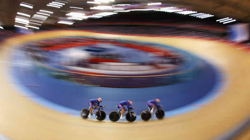 Dotsie Bausch, Jennie Reed and Sarah Hammer of the United States ride in a heat against Australia on Day 8 of the London 2012 Olympic Games at the Velodrome in London, England. The Americans took silver in the final.