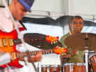 Drummer Jack DeJohnette (right) performs with guitarist Dave Fiuczynski (left) at the 2012 Newport Jazz Festival.