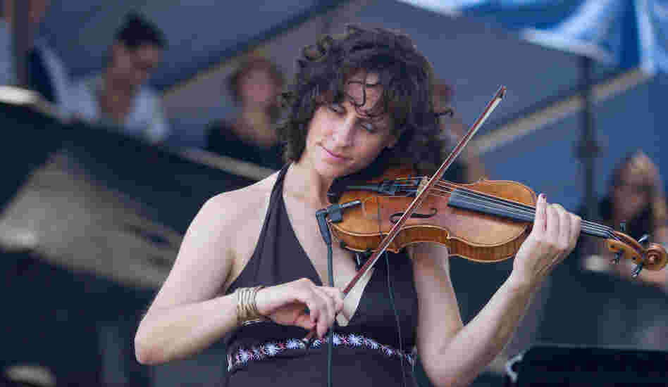 Violinist Jenny Scheinman performs with Bill Frisell at the 2012 Newport Jazz Festival.