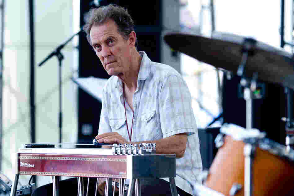 Greg Leisz plays pedal steel guitar to accompany Bill Frisell at the 2012 Newport Jazz Festival.
