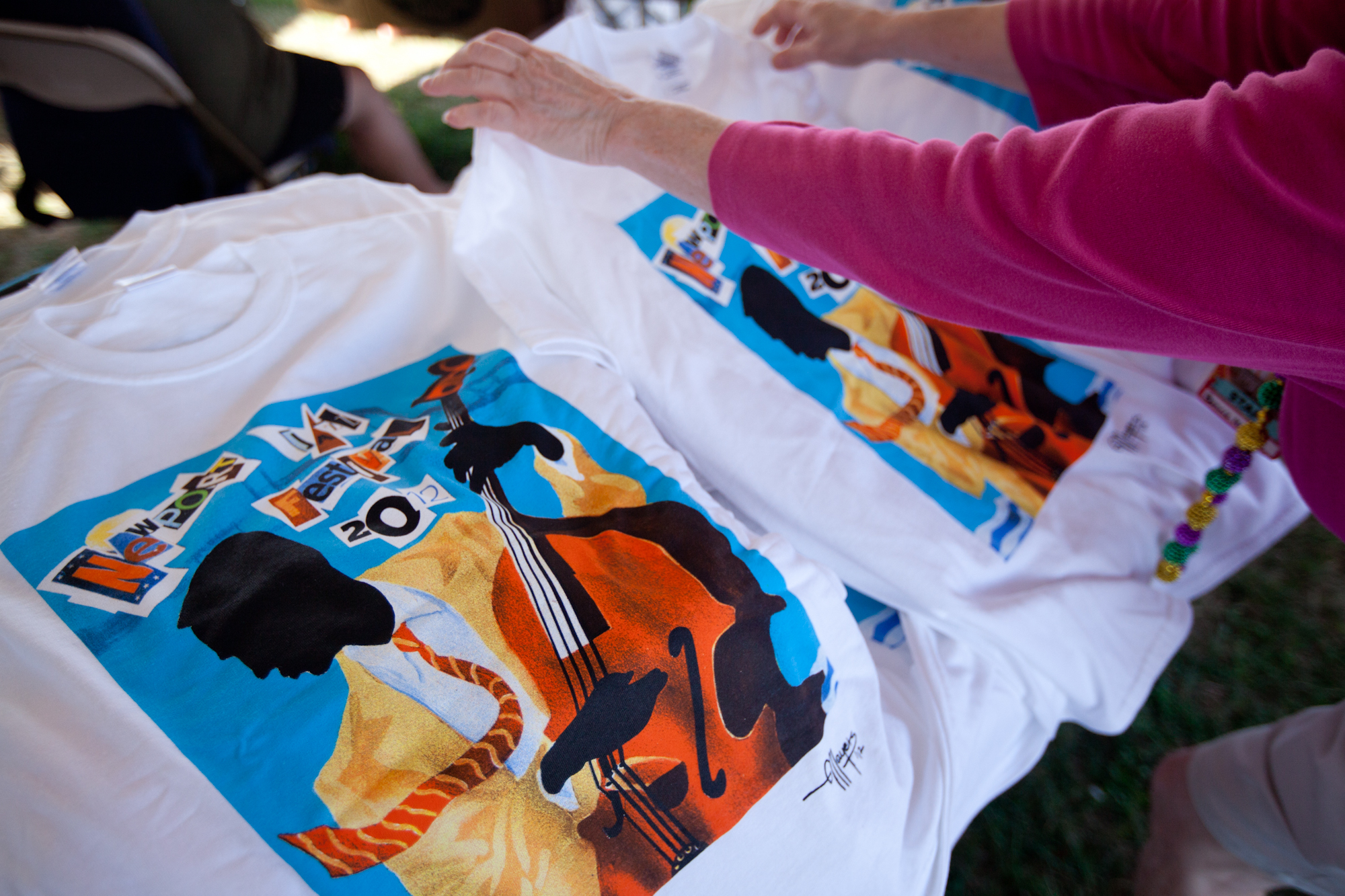 Give the drummer some... of that Newport Jazz Festival merch. 