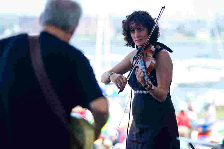 Jenny Scheinman and Bill Frisell perform songs of John Lennon on Saturday of the 2012 Newport Jazz Festival. The two will perform as a duo on Sunday.