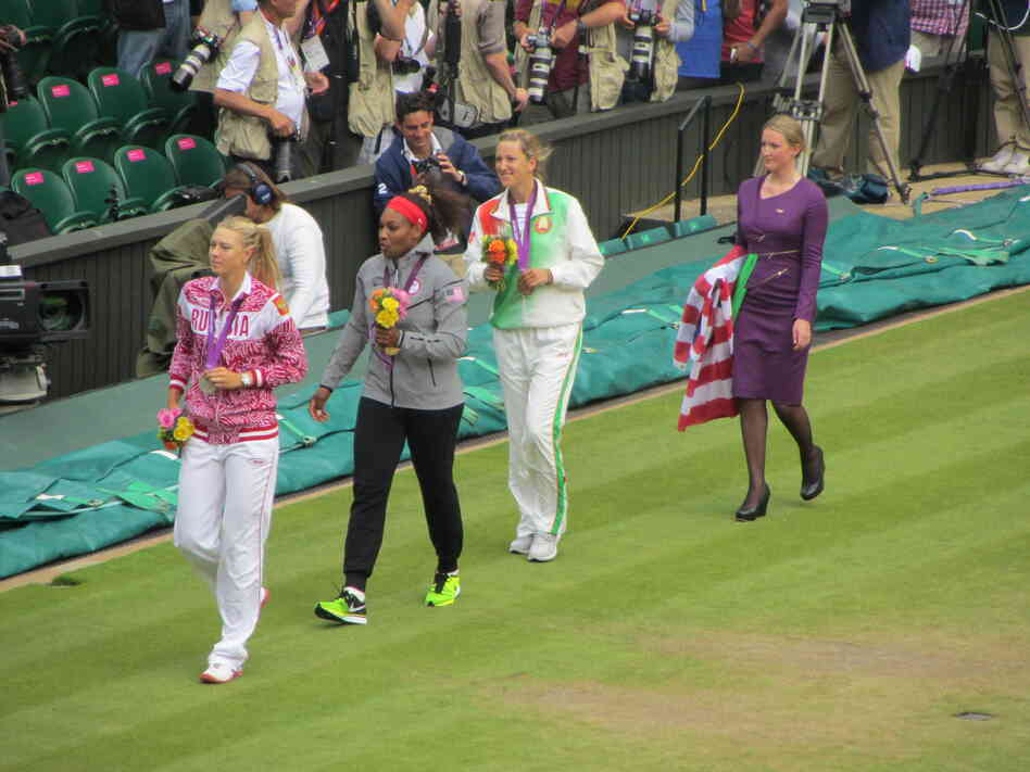 The U.S. flag fell from the display rod during Saturday's Olympic medal ceremony at Wimbledon, after Serena Williams' victory. The flag was collected in the stands and sent onto the court.