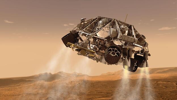 An artist's concept of NASA's Mars Science Laboratory spacecraft depicts the final minute before the rover, Curiosity, touches down on the surface of Mars.