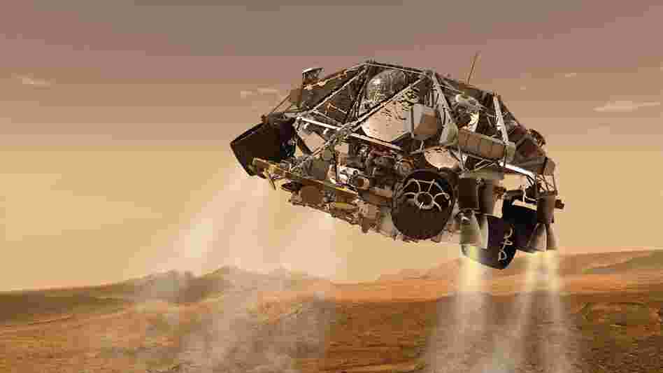 An artist's concept of NASA's Mars Science Laboratory spacecraft depicts the final minute before the rover, Curiosity, touches down on the surface of Mars.