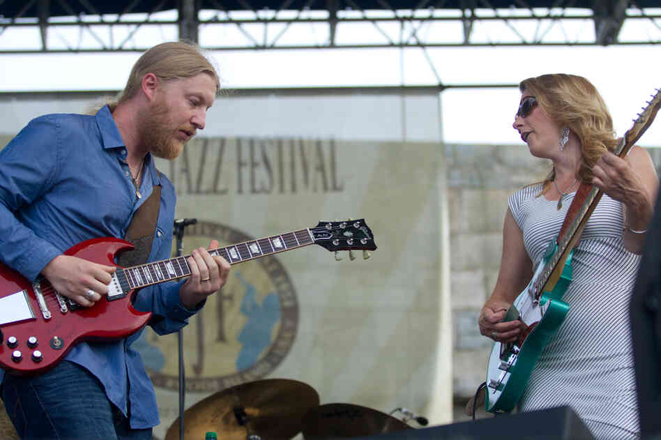 The husband-and-wife team of guitar hero Derek Trucks and mighty singer Susan Tedeschi perform on the Fort Stage. The 11-piece Tedeschi Trucks Band closed out Newport with a show which lasted nearly two hours.