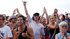 Fans celebrate the close of the Newport Jazz Festival. Fans celebrate the close of the Newport Jazz Festival.