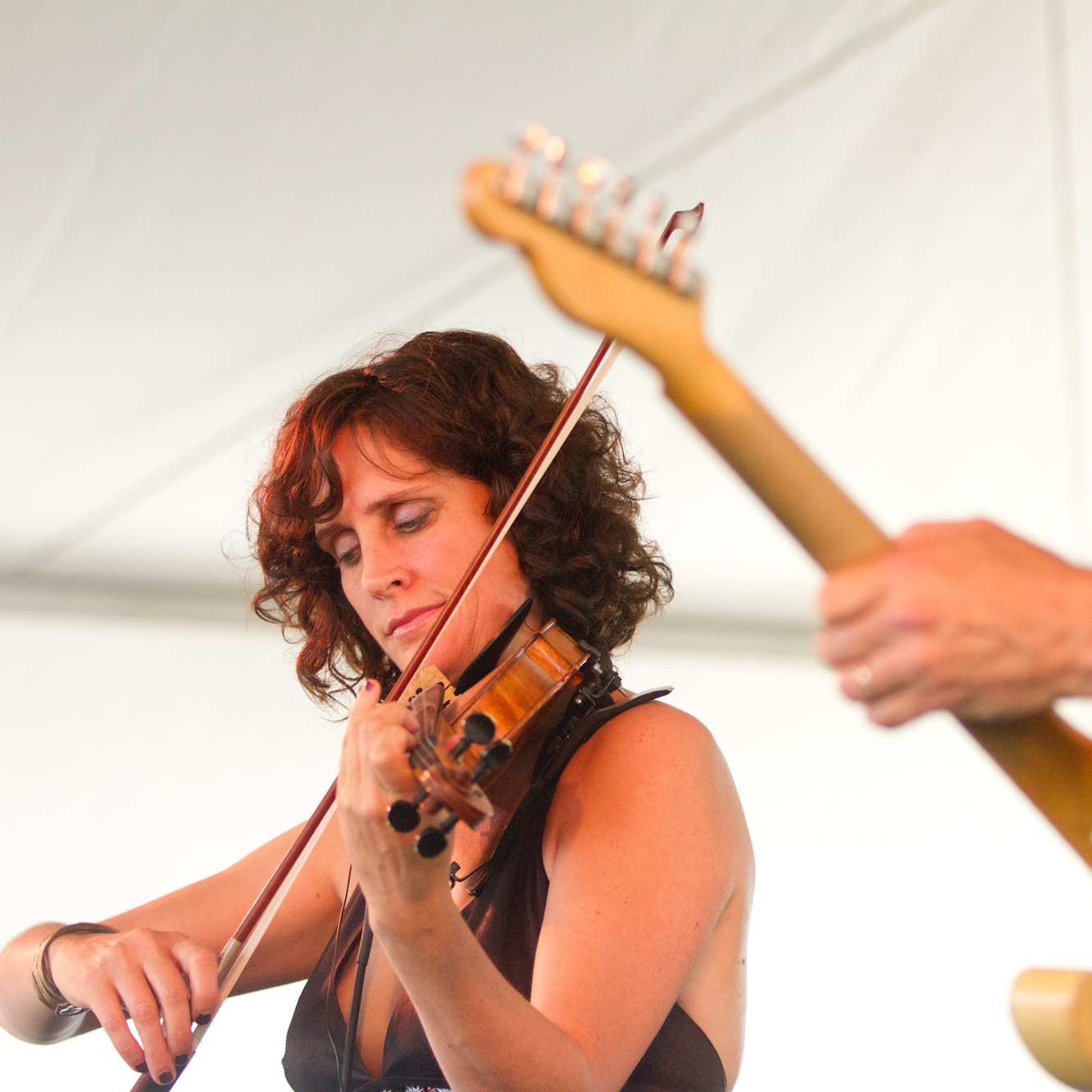 Violinist Jenny Scheinman and guitarist Bill Frisell perform at the 2012 Newport Jazz Festival.
