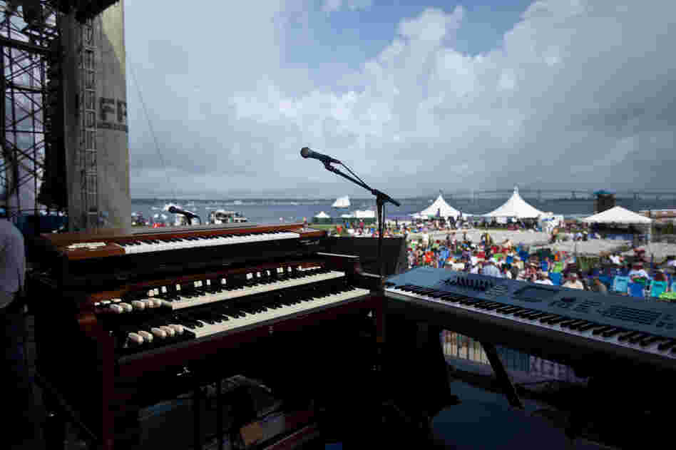 Preparations are underway on the main Fort Stage at the Newport Jazz Festival, overlooking the Pell Bridge and the pleasure craft of Narragansett Bay.