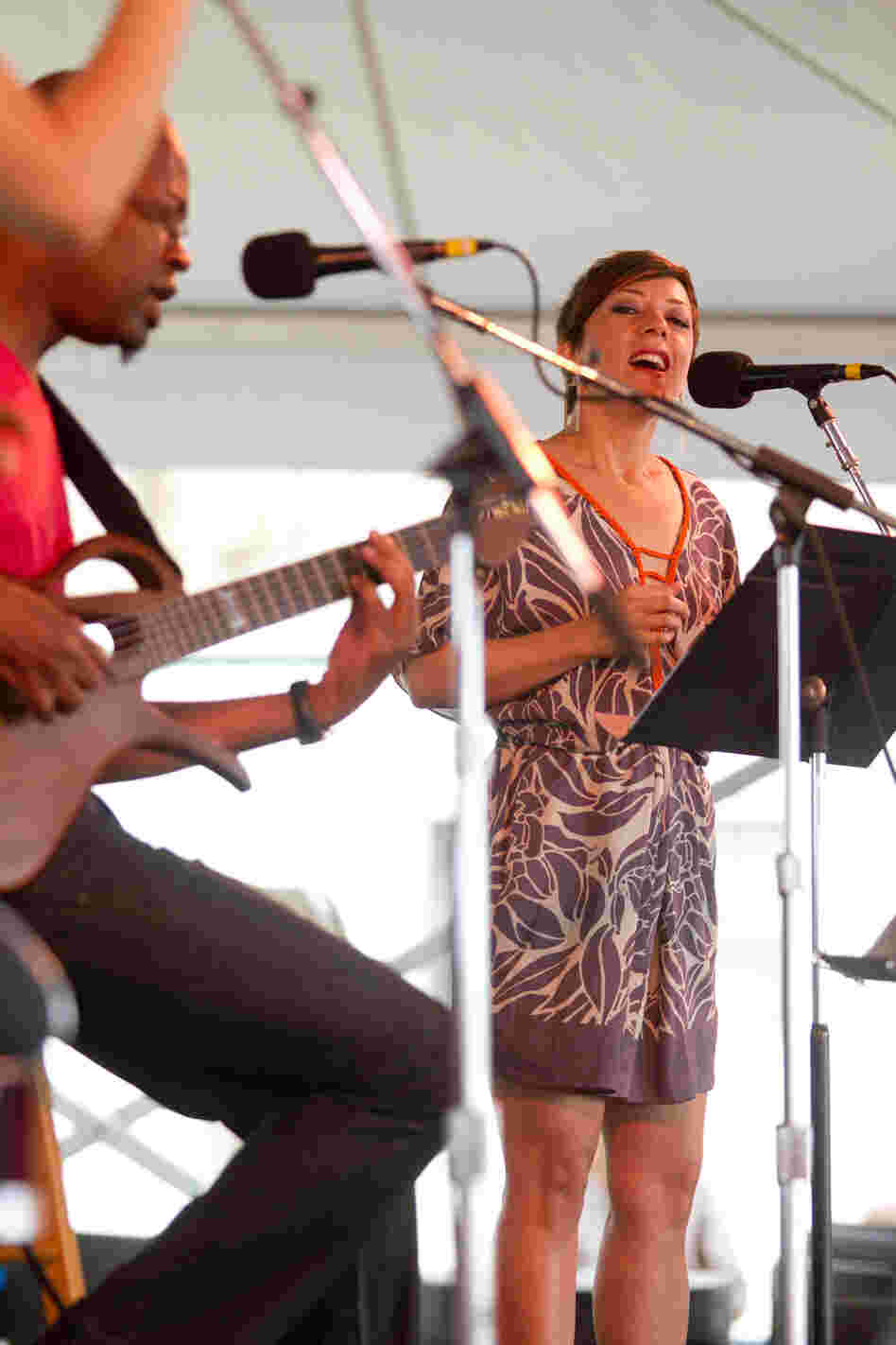 Gretchen Parlato (right) and Lionel Loueke met in a prestigious graduate jazz program and have been performing together ever since. They've previously led their own bands at Newport, but on Sunday at the Harbor Stage, they were offered a more intimate billing.