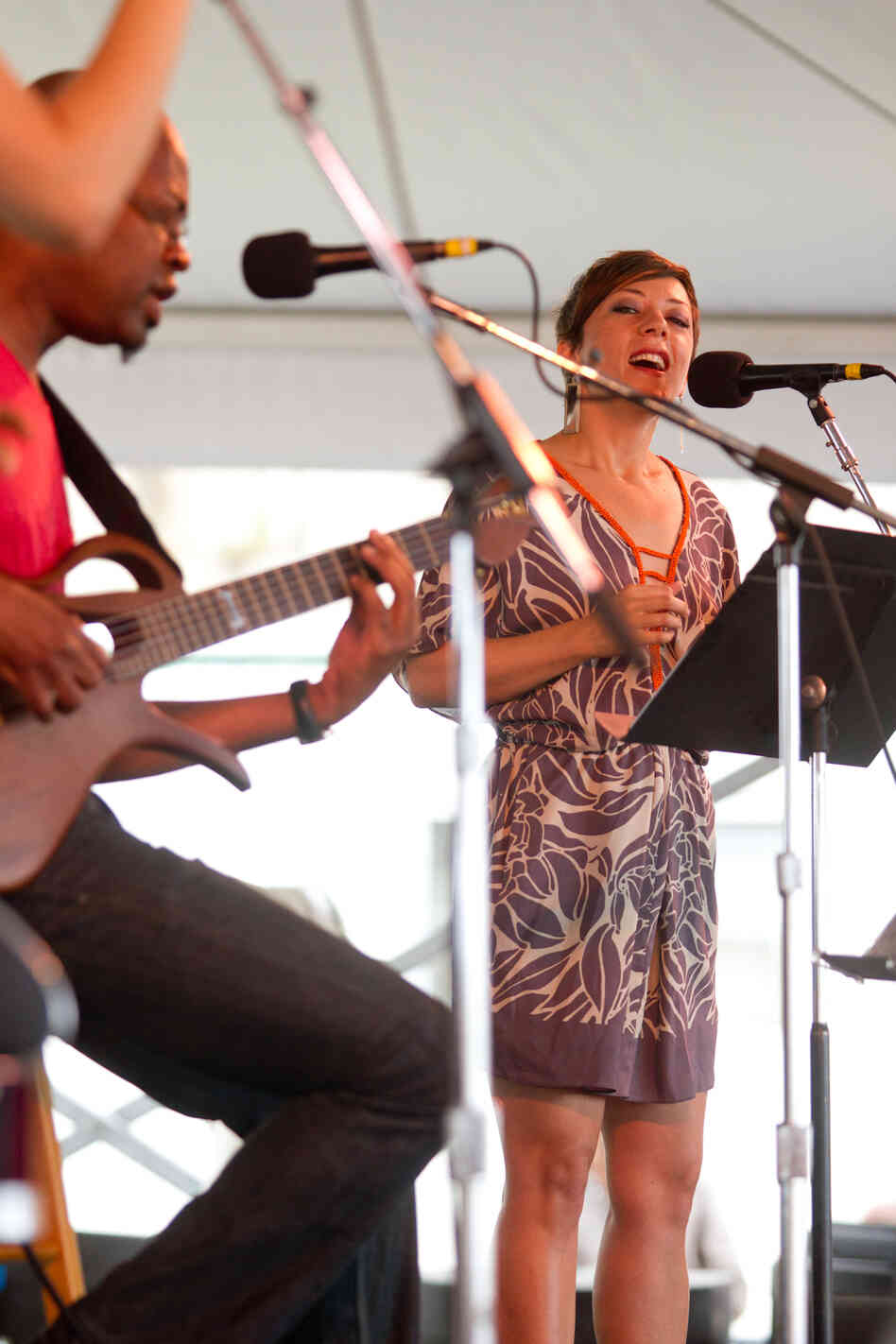 Gretchen Parlato (right) and Lionel Loueke met in a prestigious graduate jazz program and have been performing together ever since. They've previously led their own bands at Newport, but on Sunday at the Harbor Stage, they were offered a more intimate billing.