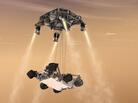 An artist's rendering shows a rocket-powered descent stage lowering the one-ton Curiosity rover to the Mars surface. An artist's rendering shows a rocket-powered descent stage lowering the one-ton Curiosity rover to the Mars surface.