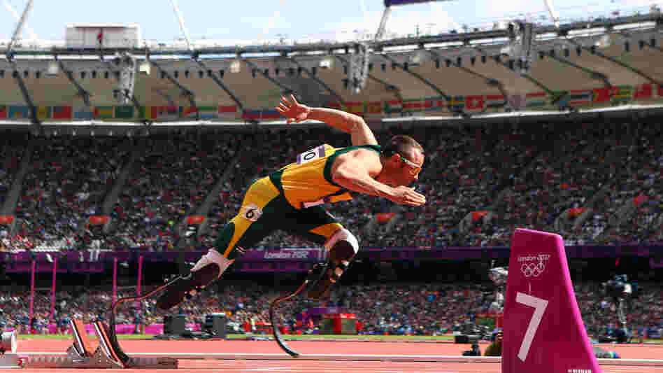 Oscar Pistorius of South Africa leaving the starting blocks in Saturday's round 1 of the men's 400-meters race.