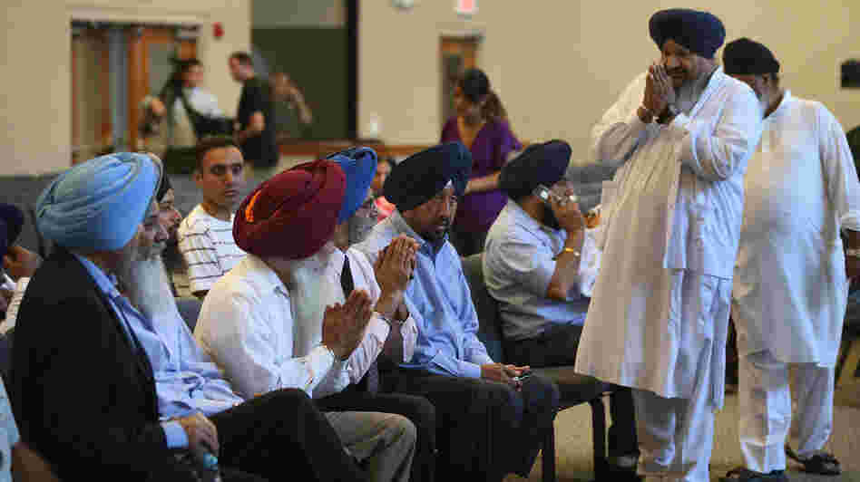 Members of the Milwaukee-area Sikh community gather Monday in Oak Creek, Wis., to learn more information about a shooting spree that left six people dead. Sikhs have faced a number of attacks in the U.S. in recent years. Members of the Milwaukee-area Sikh community gather Monday in Oak Creek, Wis., to learn more information about a shooting spree that left six people dead. Sikhs have faced a number of attacks in the U.S. in recent years.