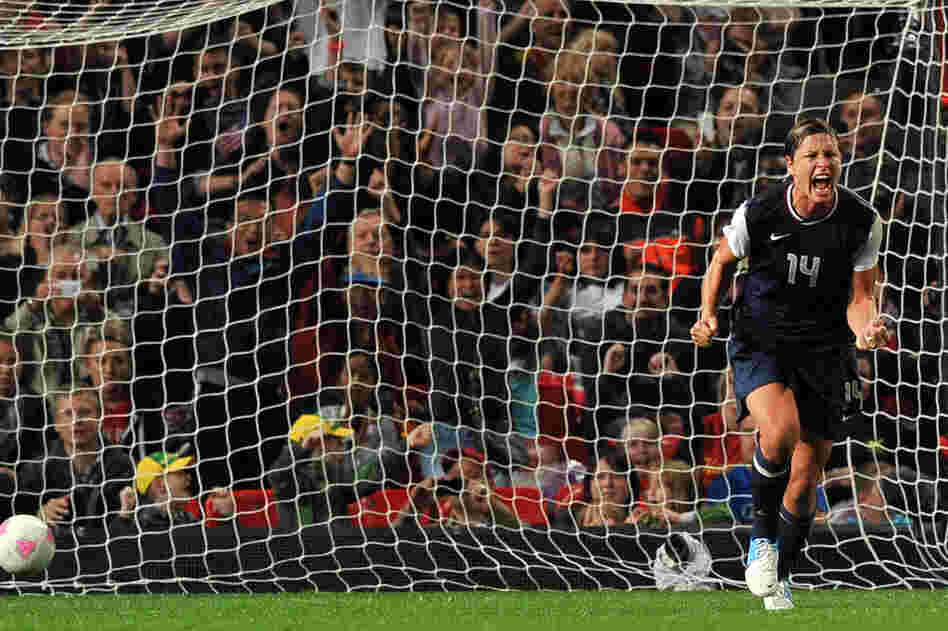 U.S. forward Abby Wambach celebrates after scoring on a penalty kick during the semifinal match against Canada. The U.S. team won 4-3.