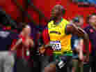 Usain Bolt of Jamaica celebrates winning gold in the Men's 100m Final yesterday. If you get your Olympics coverage on television, you didn't see it live.