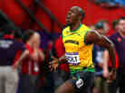 Usain Bolt of Jamaica celebrates winning gold in the Men's 100m Final yesterday. If you get your Olympics coverage on television, you didn't see it live.