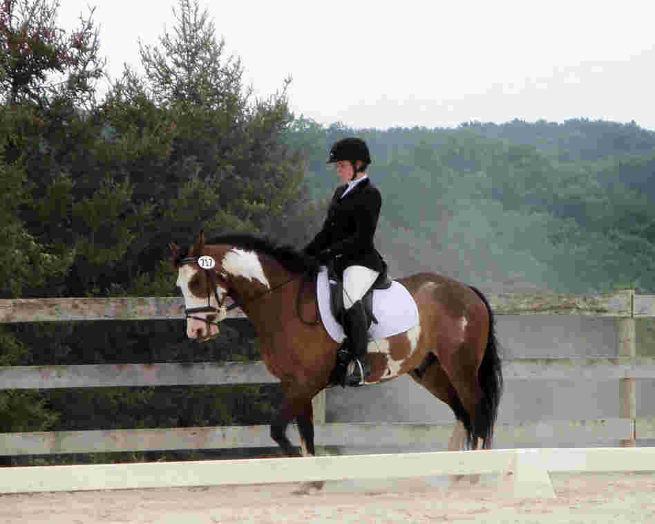 College student Celia Rozanski rides Jasper at a horse show sponsored by the Potomac Valley Dressage Association.