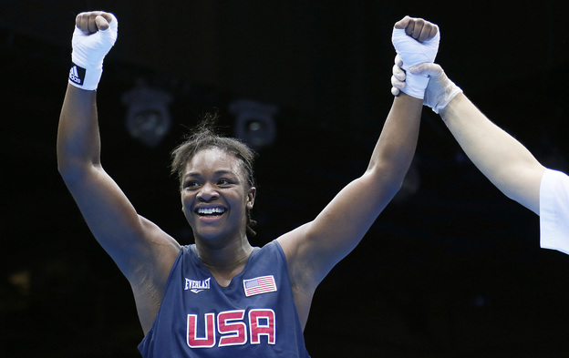 U.S. boxer Claressa Shields is declared the winner on points over Anna Laurell of Sweden in the women's middleweight boxing quarterfinals at the 2012 London Olympic Games.