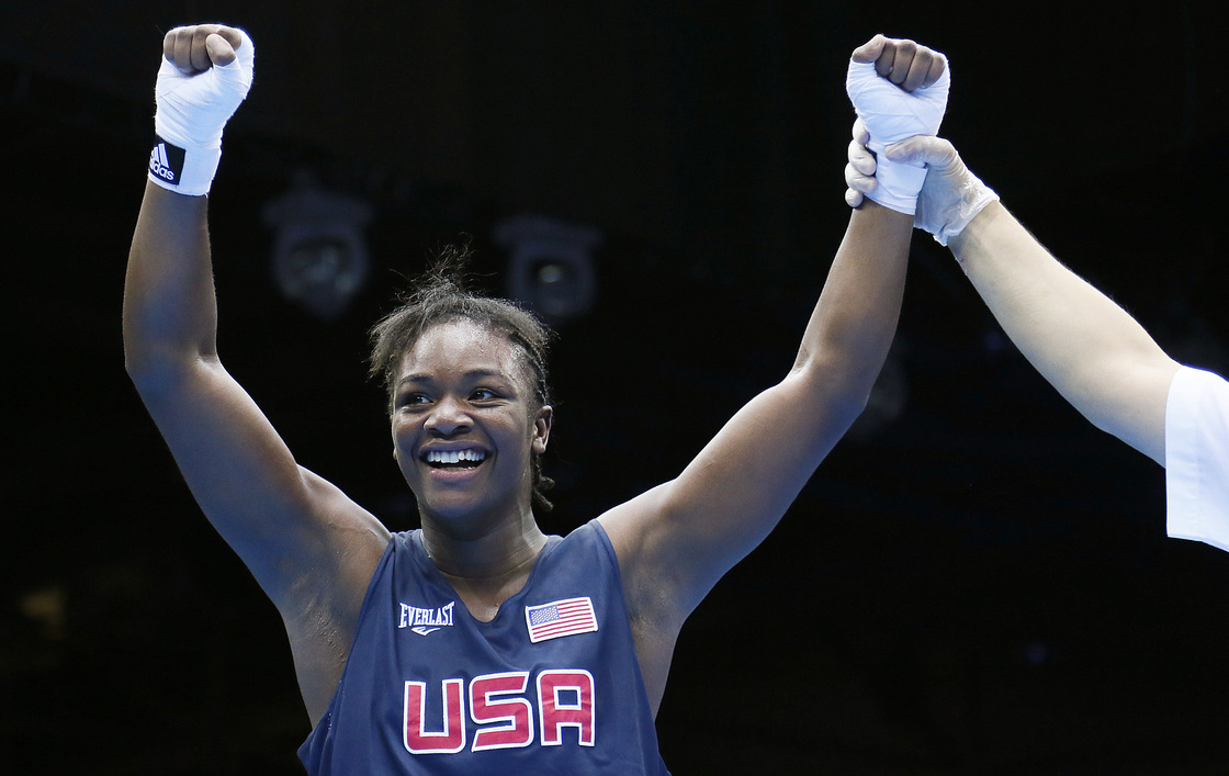 U.S. boxer Claressa Shields is declared the winner on points over Anna Laurell of Sweden in the women's middleweight boxing quarterfinals at the 2012 London Olympic Games.