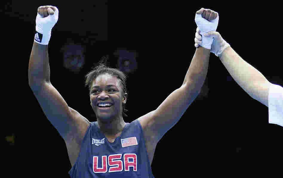 U.S. boxer Claressa Shields is declared the winner on points over Anna Laurell of Sweden in the women's middleweight boxing quarterfinals at the 2012 London Olympic Games.