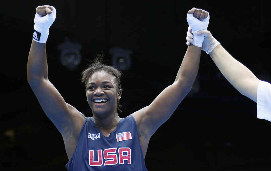 U.S. boxer Claressa Shields is declared the winner on points over Anna Laurell of Sweden in the women's middleweight boxing quarterfinals at the 2012 London Olympic Games.