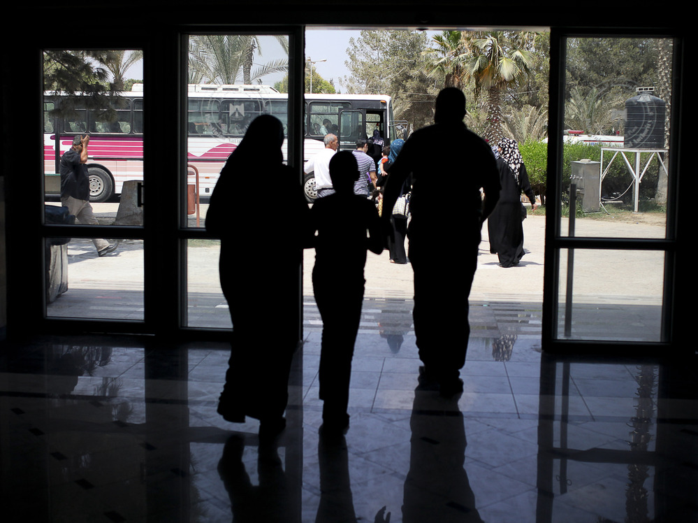 Days before Egypt shut down the Rafah border crossing, Palestinians were seen leaving the terminal to get on buses that would take them to Egypt.