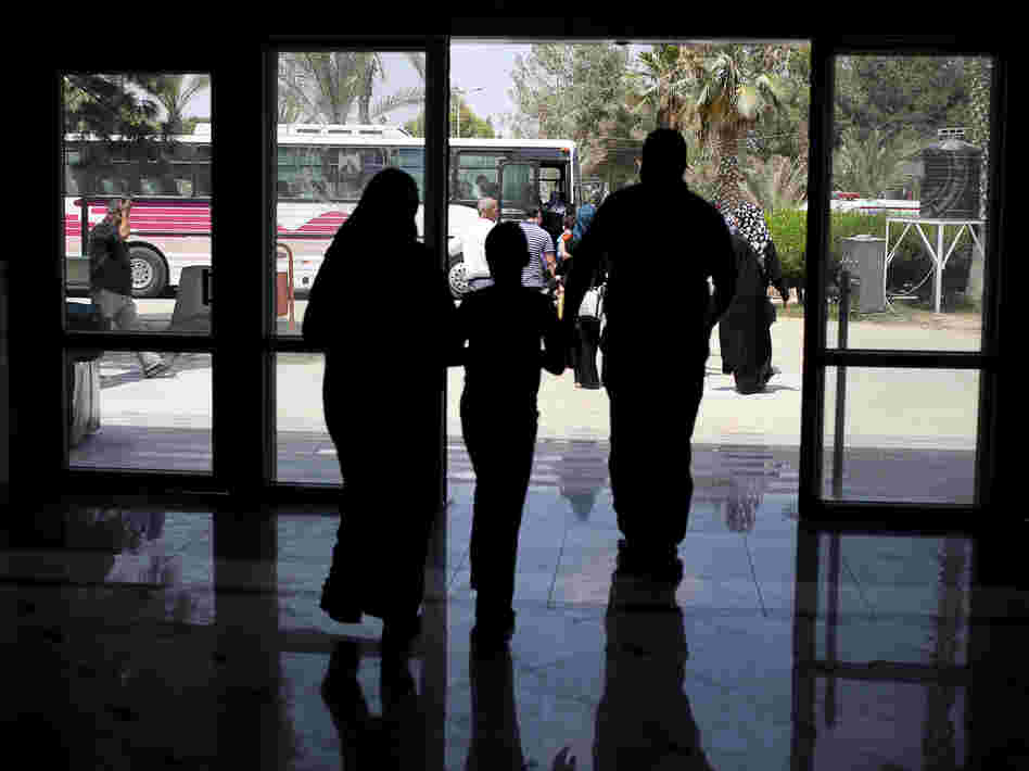 Days before Egypt shut down the Rafah border crossing, Palestinians were seen leaving the terminal to get on buses that would take them to Egypt.