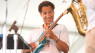 David Gilmore from Rudresh Mahanthappa's Samdhi is all smiles at the Newport Jazz Festival. David Gilmore from Rudresh Mahanthappa's Samdhi is all smiles at the Newport Jazz Festival.