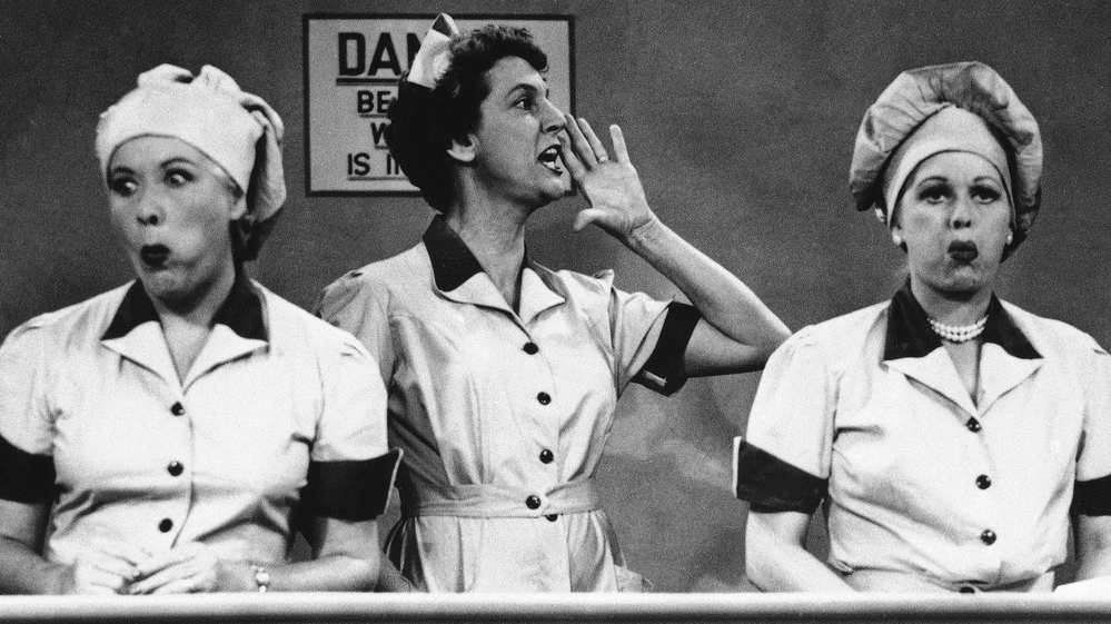Vivian Vance and Lucille Ball ham it up at the chocolate factory in a famous food-centric episode of "I Love Lucy."