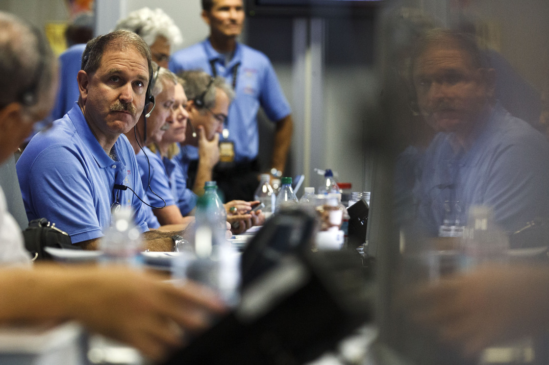 NASA Associate Administrator John Grunsfeld waits for landing inside the Spaceflight Operations Facility for NASA's Mars Science Laboratory Curiosity rover at Jet Propulsion Laboratory in Pasadena, Calif. on Sunday.