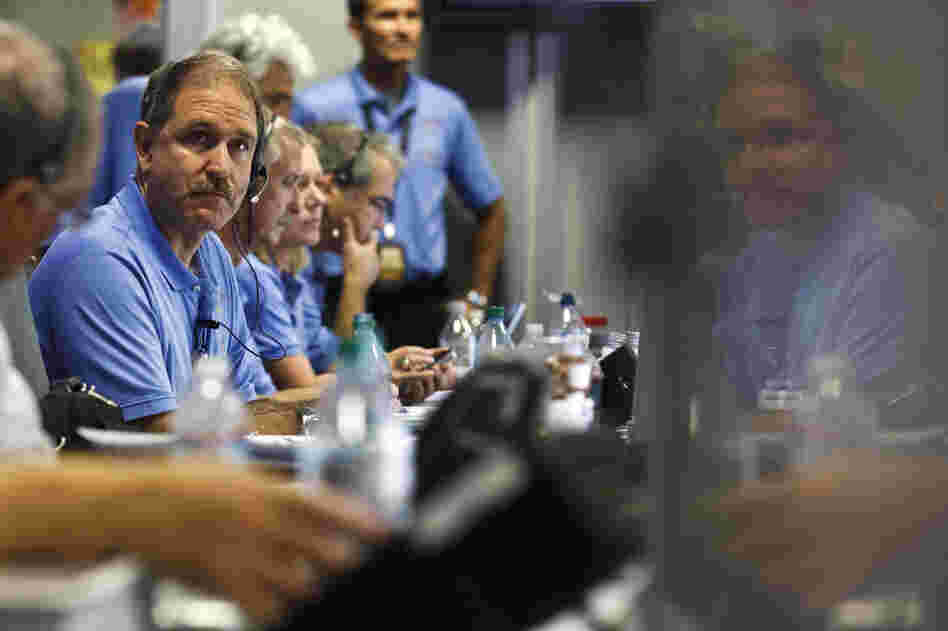 NASA Associate Administrator John Grunsfeld waits for landing inside the Spaceflight Operations Facility for NASA's Mars Science Laboratory Curiosity rover at Jet Propulsion Laboratory in Pasadena, Calif. on Sunday.