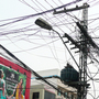 Tangled power lines in a busy shopping district in Rawalpindi.